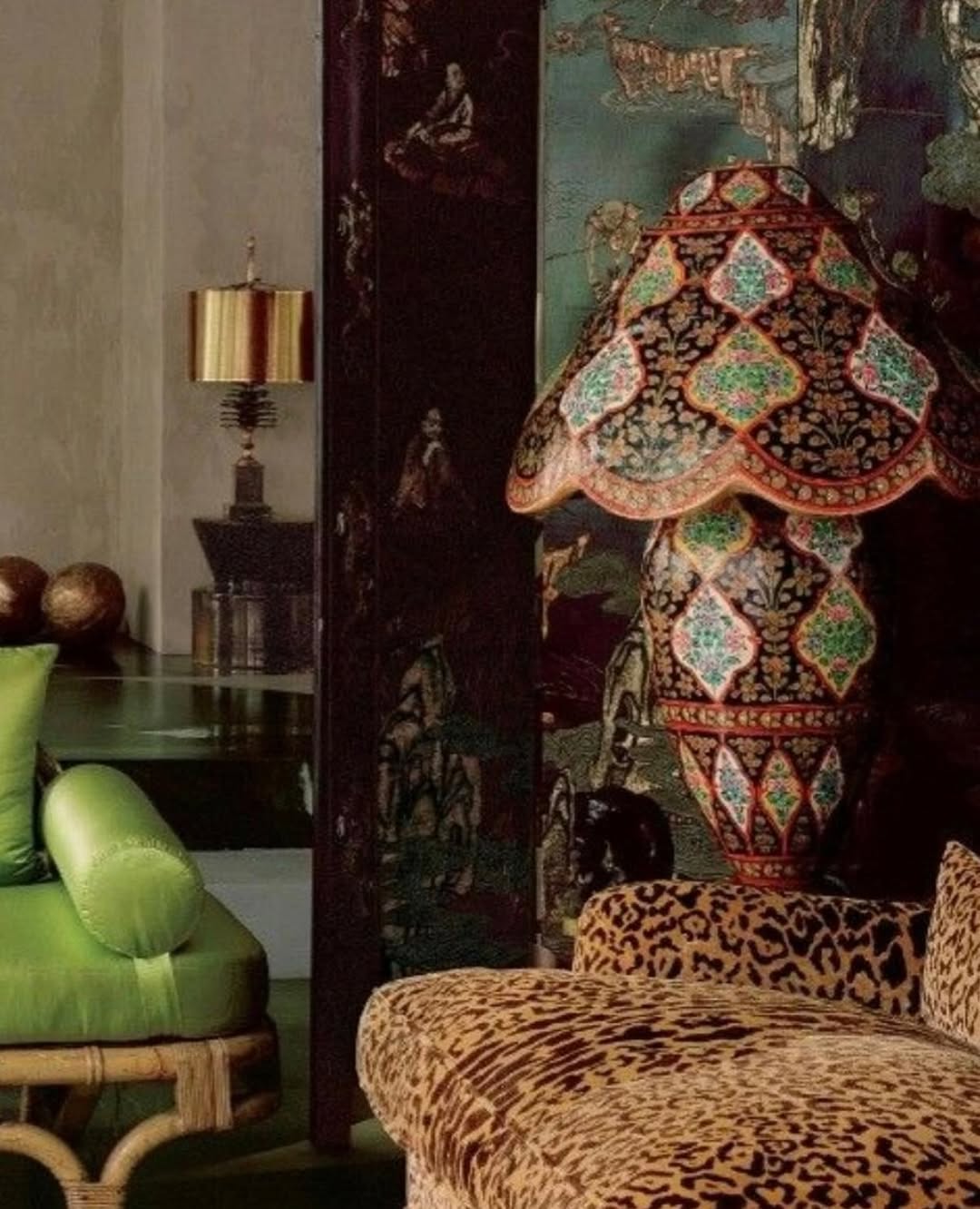 Interior design shot featuring a leopard print chair and an ornate lamp.